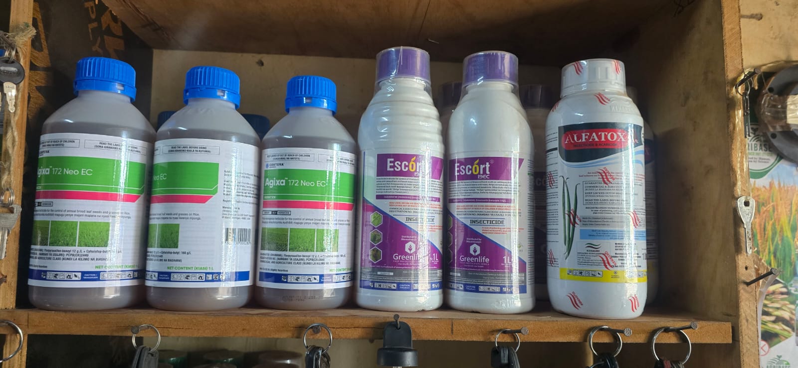 Agixa and Escort agrochemical products on shelf